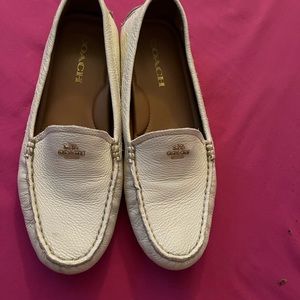 Coach, White leather driving shoes. Very comfortable and look great on. Classy!